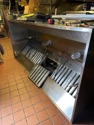 One 9 Foot  Stainless Steel Hood System With Lights, Filters, Piping And Ansul.