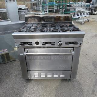 One WORKING  US Range Natural Gas 6 Burner/Convection Oven  Range With 2 Racks, On Casters. Model# PS-6-26RC. 36X32X43. $11,761.00.