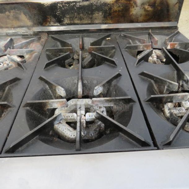 One WORKING  US Range Natural Gas 6 Burner/Convection Oven  Range With 2 Racks, On Casters. Model# PS-6-26RC. 36X32X43. $11,761.00. - Image 2 of 4