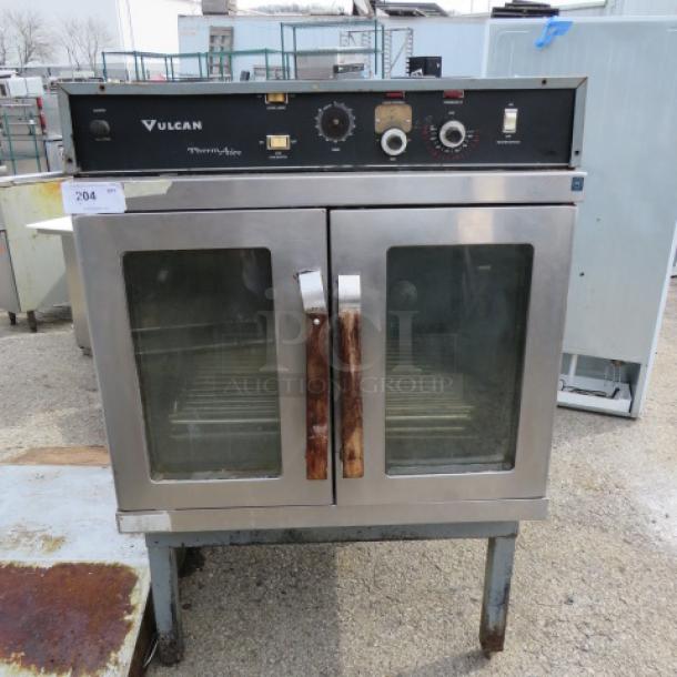 One Vulcan Thermaire Electric Convection Oven With 5 Racks. Model# ET-10. 208 Volt. 35.5X37X54. - Image 1 of 3
