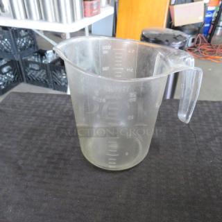 One 1 Quart Measurer.