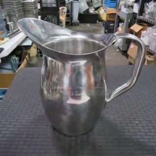 One Stainless Steel American Metalcraft Bell Pitcher.