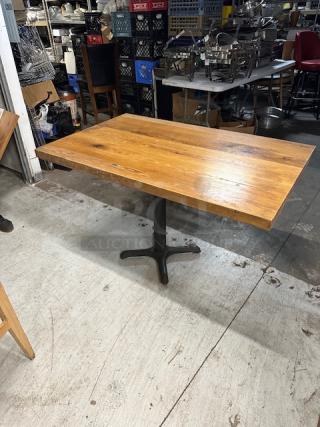 One Solid Wooden Rectangular Table On A Pedestal Base. 48X30X29