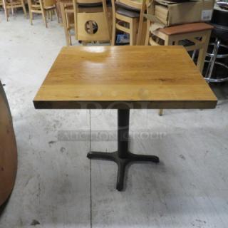 One Solid Wooden Table On A Pedestal Base.  24X30X29