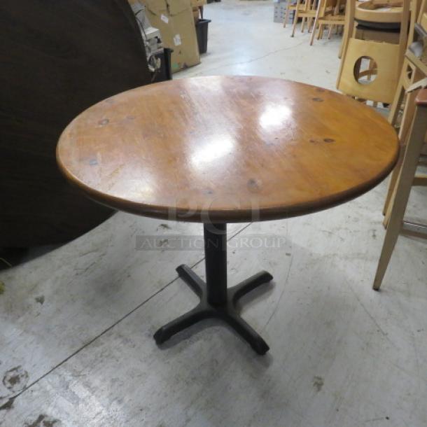 One Wooden Round Table On A Pedestal Base. 36X36X29 - Image 1 of 1