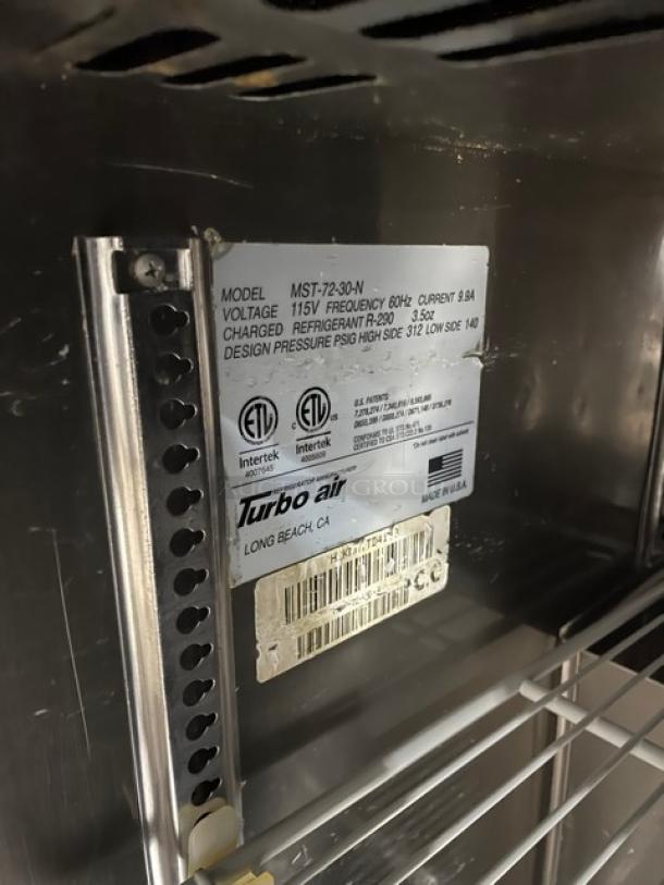 Turbo-Air Commercial Stainless Steel 3 Door Refrigerated Bain Marie Style Mega Top Salad/Sandwich Prep Table! With Poly Coated Wire Rack! Model: MST-72-30-N! 115V 1 Phase! On Casters! - Image 8 of 9