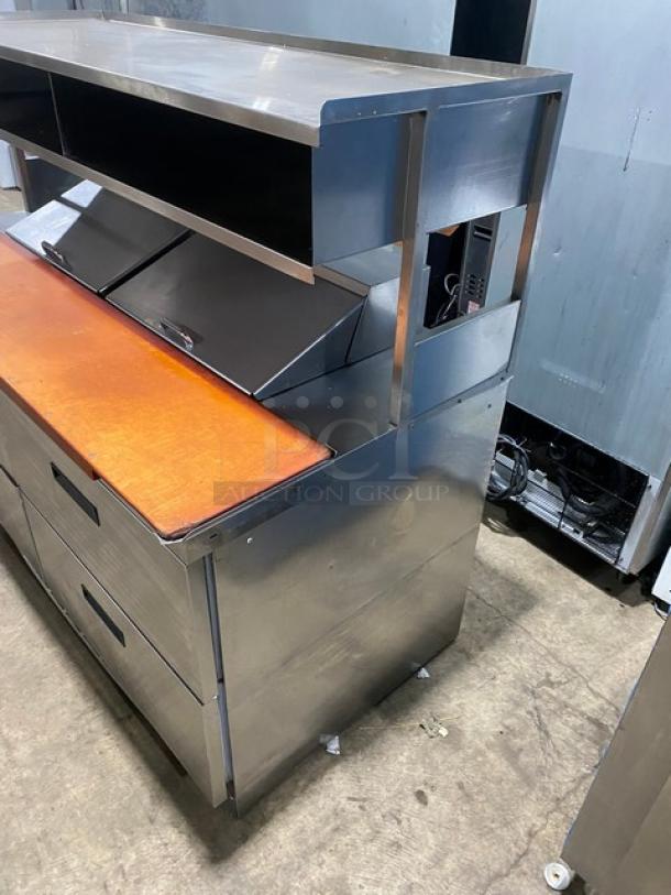 Delfield Commercial Stainless Steel 4 Drawer Refrigerated Bain Marie Style Mega Top Salad/Sandwich Prep Table! With Enclosed Overhead Storage Shelf! With Wooden Butcher/Chopping Block Style Cutting Board! Model: UCD4464N-12-DD5 SN: 1405152001114! 115V 1 Phase! On Casters! - Image 2 of 10
