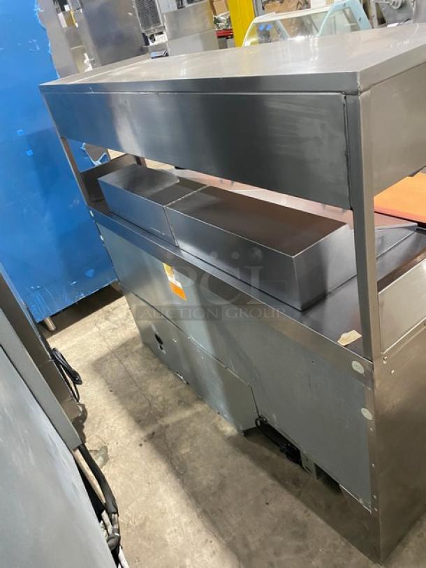 Delfield Commercial Stainless Steel 4 Drawer Refrigerated Bain Marie Style Mega Top Salad/Sandwich Prep Table! With Enclosed Overhead Storage Shelf! With Wooden Butcher/Chopping Block Style Cutting Board! Model: UCD4464N-12-DD5 SN: 1405152001114! 115V 1 Phase! On Casters! - Image 4 of 10