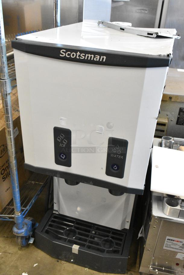 BRAND NEW SCRATCH AND DENT! 2024 Scotsman HID312AB-1A Stainless Steel Meridian Countertop Air Cooled Ice Machine and Water Dispenser with Push Button Dispensing - 12 lb. Bin Storage. 115 Volts, 1 Phase. - Image 4 of 6