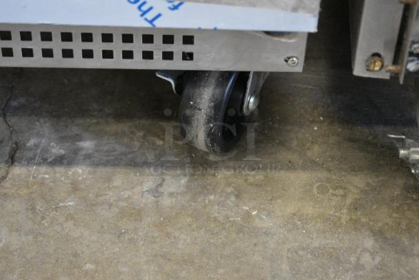 BRAND NEW SCRATCH AND DENT! 2021 Berg EDMT 48 18 BERG HC Stainless Steel Commercial Sandwich Salad Prep Table Bain Marie Mega Top on Commercial Casters 115 Volts, 1 Phase. Tested and Working! - Image 4 of 10