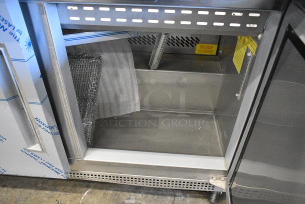 BRAND NEW SCRATCH AND DENT! 2021 Berg EDMT 48 18 BERG HC Stainless Steel Commercial Sandwich Salad Prep Table Bain Marie Mega Top on Commercial Casters 115 Volts, 1 Phase. Tested and Working! - Image 9 of 10