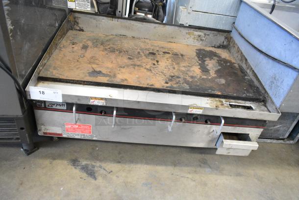APW Wyott Stainless Steel Commercial Countertop Natural Gas Powered Flat Top Griddle. - Image 1 of 5