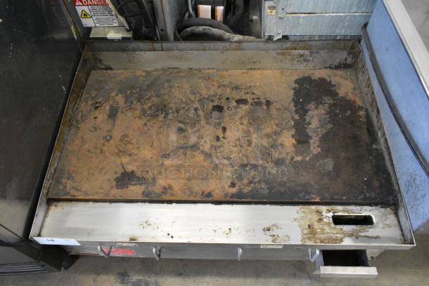 APW Wyott Stainless Steel Commercial Countertop Natural Gas Powered Flat Top Griddle. - Image 4 of 5