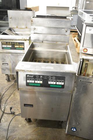 Pitco Frialator SFSG18-US Stainless Steel Commercial Floor Style Natural Gas Powered Deep Fat Fryer on Commercial Casters. 140,000 BTU.