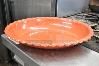 2 Orange Oval Bowls. 2 Times Your Bid!