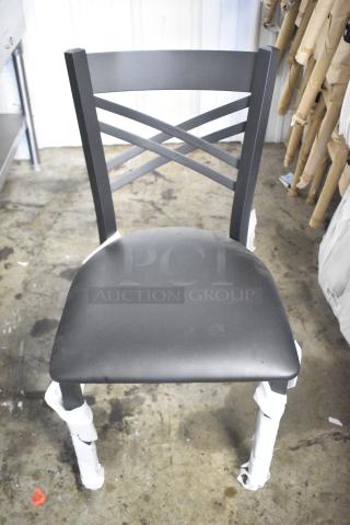 8 BRAND NEW SCRATCH AND DENT! Lancaster Table & Seating 164CCROSSFR Black Metal Dining Height Cross Back Chair w/ Black Seat Cushion. 8 Times Your Bid!
