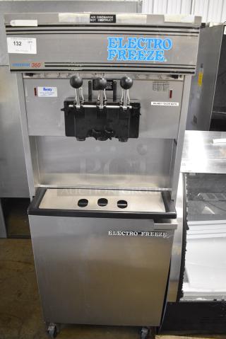 Electro Freeze 88T-CMT-113 Stainless Steel Commercial Floor Style Water Cooled 2 Flavor w/ Twist Soft Serve Ice Cream Machine on Commercial Casters. 230 Volts, 1 Phase.