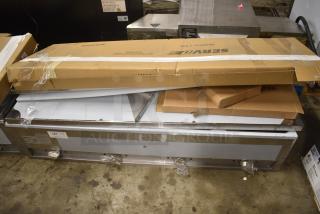 BRAND NEW SCRATCH AND DENT! 2024 ServIt 423EST4WOPBH Four Pan Open Well Electric Steam Table with Partially Enclosed Base. 208/240 Volts, 1 Phase.