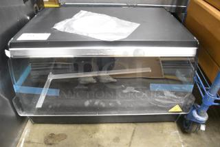 BRAND NEW SCRATCH AND DENT! Avantco 177OAM1A 26" Black Countertop Merchandiser with LED Lighting and 1 Shelf. 120 Volts, 1 Phase. Tested and Working!