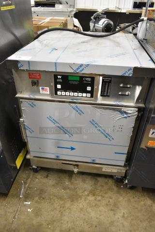 BRAND NEW SCRATCH AND DENT! 2018 Winston CAC507GR CVap Stainless Steel Commercial Cook and Hold Cabinet on Commercial Casters. 208 Volts, 1 Phase.