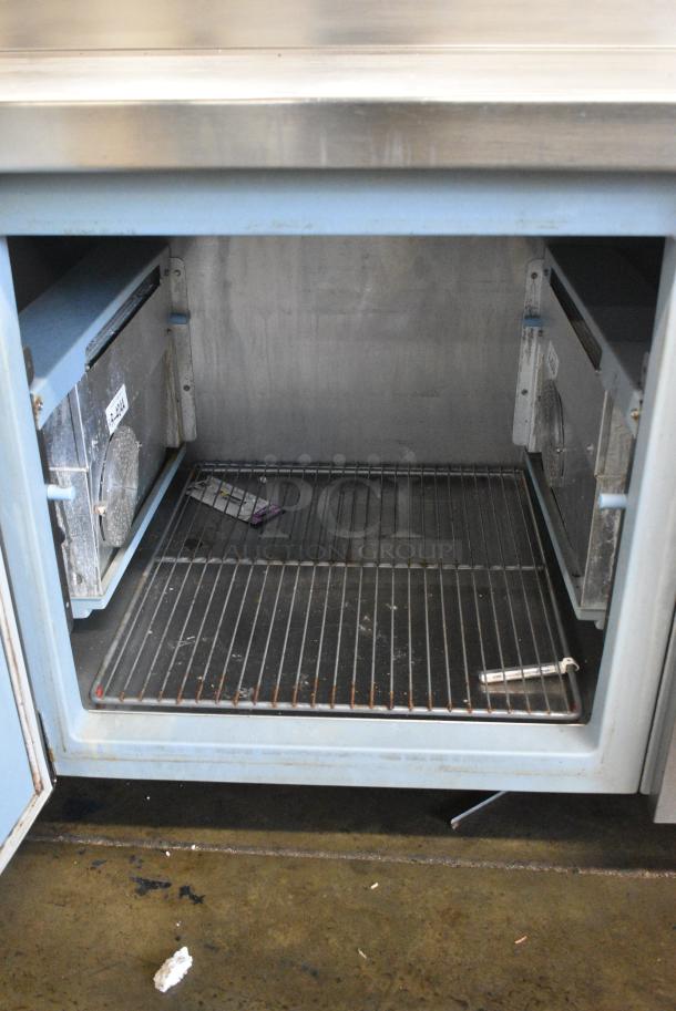 Delfield Stainless Steel Commercial Prep Table on Commercial Casters. 115 Volts, 1 Phase. Tested and Powers On But Does Not Get Cold - Image 4 of 7