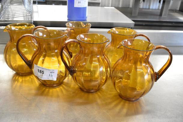 ALL ONE MONEY! Lot of 6 Amber Colored Poly Pitchers - Image 1 of 7