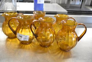 ALL ONE MONEY! Lot of 6 Amber Colored Poly Pitchers