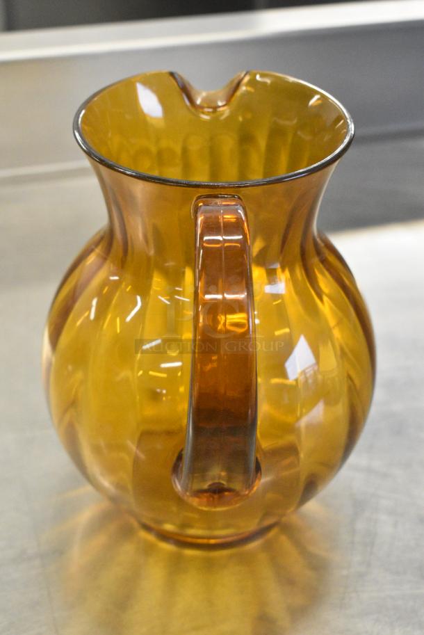 ALL ONE MONEY! Lot of 6 Amber Colored Poly Pitchers - Image 4 of 7