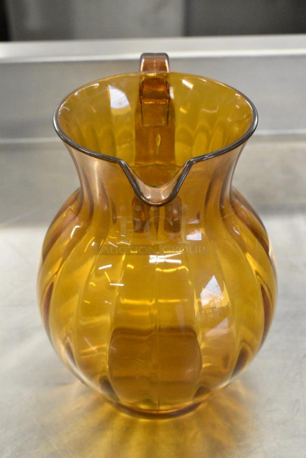 ALL ONE MONEY! Lot of 6 Amber Colored Poly Pitchers - Image 5 of 7