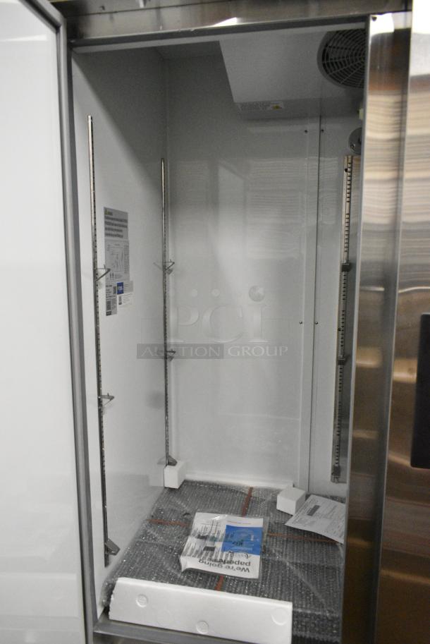 BRAND NEW SCRATCH AND DENT! 2024 Avantco 178A49RHC Stainless Steel Commercial 2 Door Reach In Cooler w/ Poly Coated Racks. 115 Volts, 1 Phase. Tested and Working! - Image 4 of 6