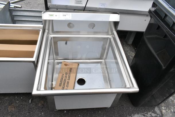 BRAND NEW SCRATCH AND DENT! Regency 600S12424 60" 16 Gauge Stainless Steel One Compartment Commercial Sink with Stainless Steel Legs, Cross Bracing, and 2 Drainboards - 24" x 24" x 14" Bowl - Image 1 of 6