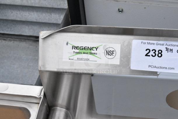BRAND NEW SCRATCH AND DENT! Regency 600S12424 60" 16 Gauge Stainless Steel One Compartment Commercial Sink with Stainless Steel Legs, Cross Bracing, and 2 Drainboards - 24" x 24" x 14" Bowl - Image 6 of 6