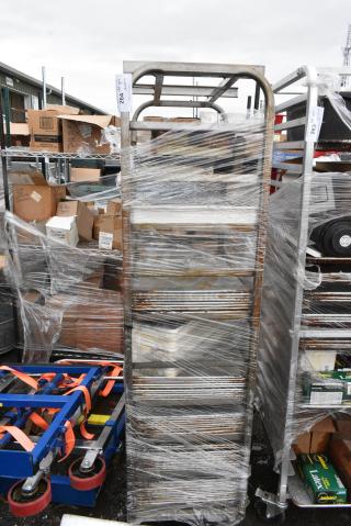 Metal Commercial Pan Transport Rack on Commercial Casters w/ Contents Including Metal Baking Pans.