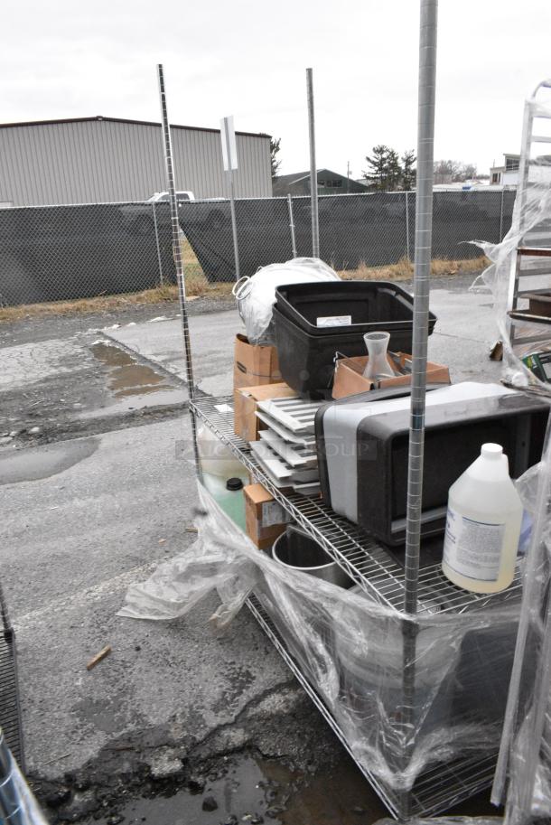 Chrome Finish 2 Tier Wire Shelving Unit w/ Contents Including Trash Can Lids and Poly Drop In Bins. BUYER MUST DISMANTLE. PCI CANNOT DISMANTLE FOR SHIPPING. PLEASE CONSIDER FREIGHT CHARGES. - Image 2 of 8