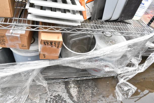 Chrome Finish 2 Tier Wire Shelving Unit w/ Contents Including Trash Can Lids and Poly Drop In Bins. BUYER MUST DISMANTLE. PCI CANNOT DISMANTLE FOR SHIPPING. PLEASE CONSIDER FREIGHT CHARGES. - Image 7 of 8
