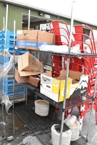 Chrome and Black Finish 3 Tier Wire Shelving Unit w/ Contents Including Dishes. BUYER MUST DISMANTLE. PCI CANNOT DISMANTLE FOR SHIPPING. PLEASE CONSIDER FREIGHT CHARGES.