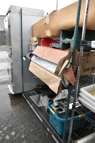 Green Finish 3 Tier Wire Shelving Unit w/ Contents Including Tarp and Booster Seats. BUYER MUST DISMANTLE. PCI CANNOT DISMANTLE FOR SHIPPING. PLEASE CONSIDER FREIGHT CHARGES.