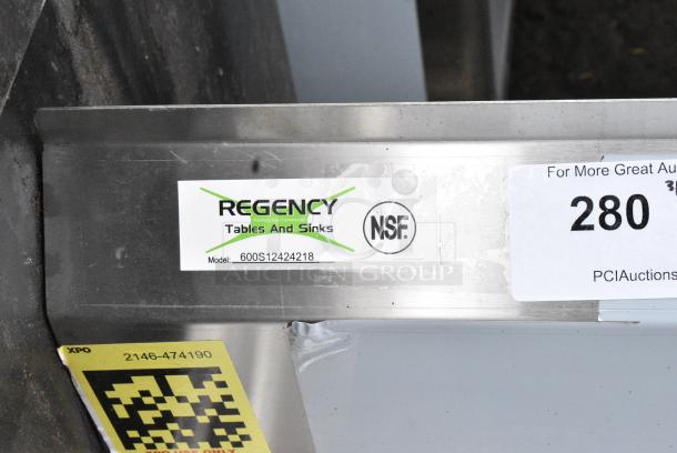 BRAND NEW SCRATCH AND DENT! Regency 600S12424218 72" 16 Gauge Stainless Steel One Compartment Commercial Sink with Stainless Steel Legs, Cross Bracing, and 2 Drainboards - 24" x 24" x 14" Bowl. No Legs. - Image 6 of 6