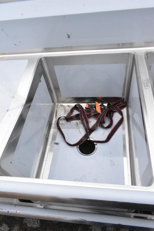 BRAND NEW SCRATCH AND DENT! Regency 600S31824224 16 Gauge Stainless Steel Three Compartment Commercial Sink with Galvanized Steel Legs and 2 Drainboards. - Image 6 of 8