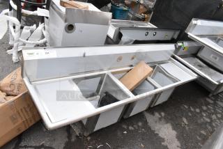 BRAND NEW SCRATCH AND DENT! Regency 600S31515215 Stainless Steel Three Compartment Commercial Sink with Galvanized Steel Legs and 2 Drainboards.