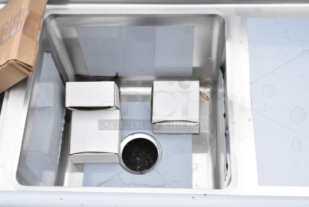 BRAND NEW SCRATCH AND DENT! Regency 600S31515215 Stainless Steel Three Compartment Commercial Sink with Galvanized Steel Legs and 2 Drainboards. - Image 4 of 8