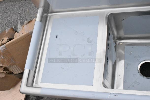 BRAND NEW SCRATCH AND DENT! Regency 600S31515215 Stainless Steel Three Compartment Commercial Sink with Galvanized Steel Legs and 2 Drainboards. - Image 7 of 8