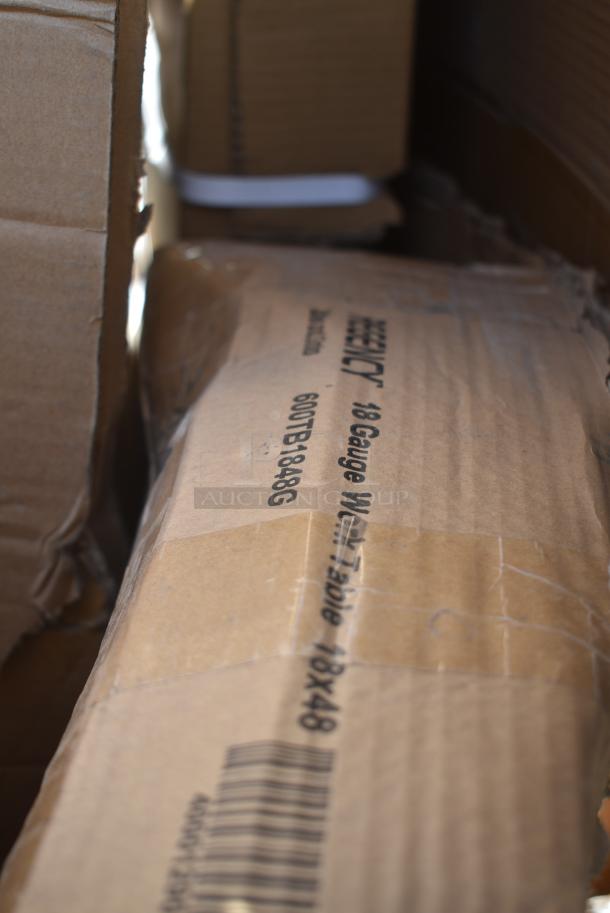 BRAND NEW SCRATCH AND DENT! Regency 600TB1848G 18" x 48" 18-Gauge 304 Stainless Steel Commercial Work Table with 4" Backsplash and Galvanized Undershelf. May Be Missing Pieces. - Image 2 of 2