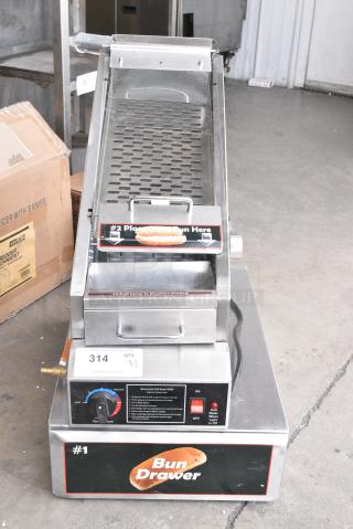 2 Items Including 2024 Benchmark USA 60024 Doghouse 24 Dog / 24 Bun Hot Dog Steamer and Dispenser and Bun Drawer. 2 Times Your Bid!
