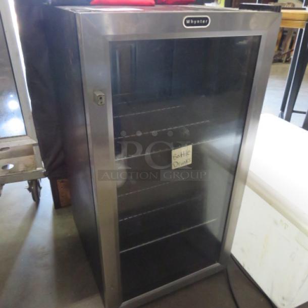 One Whynter Countertop Glass Display Cooler With 2 Racks. 120 Volt. Model# BR-130SB. 17X19X32. $505.00. - Image 2 of 3