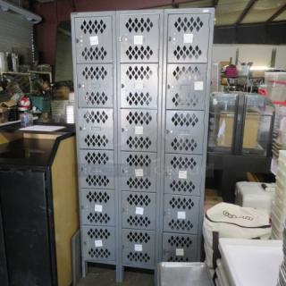 One Gray Metal Locker System With 18 Lockers. 36X18X78