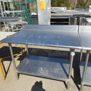 One Stainless Steel Table With SS Under Shelf And A Can Opener Bracket. 50X30X40
