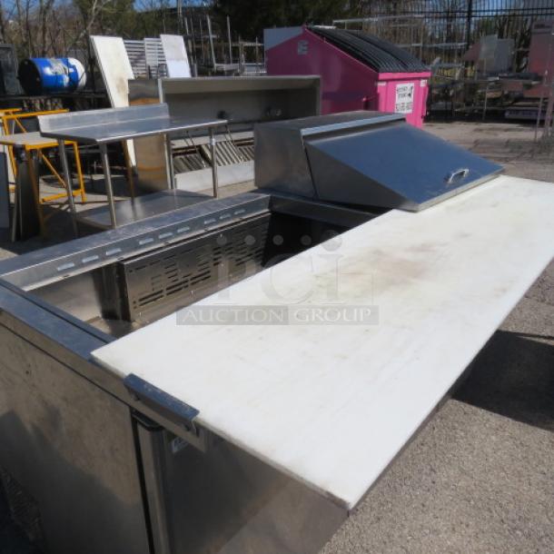 One Turbo Air 3 Door Refrigerated Prep Table With Cutting Board And 3 Racks, On Casters. Missing 1 Lid. Model# TST-72SD-30-N. 115 Volt. 73X34X45 - Image 4 of 4