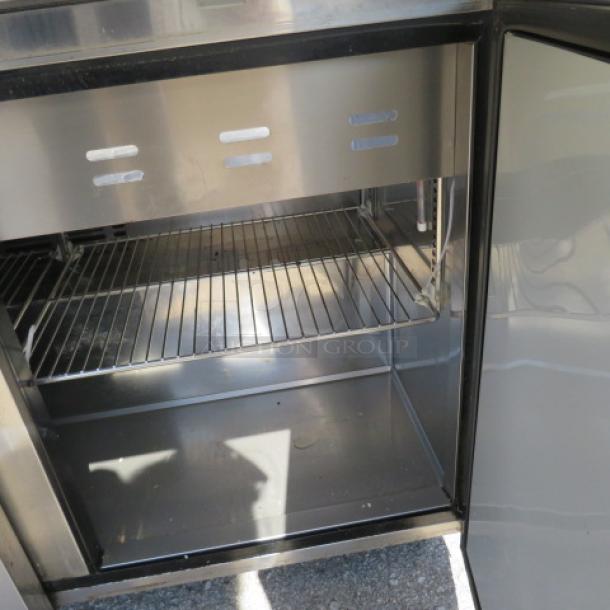 One Turbo Air 3 Door Refrigerated Prep Table With Cutting Board And 3 Racks, On Casters. Missing 2 Lids. Model# TST-72SD-30-N. 115 Volt. 73X34X45 - Image 3 of 3