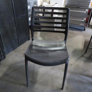 Black Stack Indoor/Outdoor Chair. 2XBID